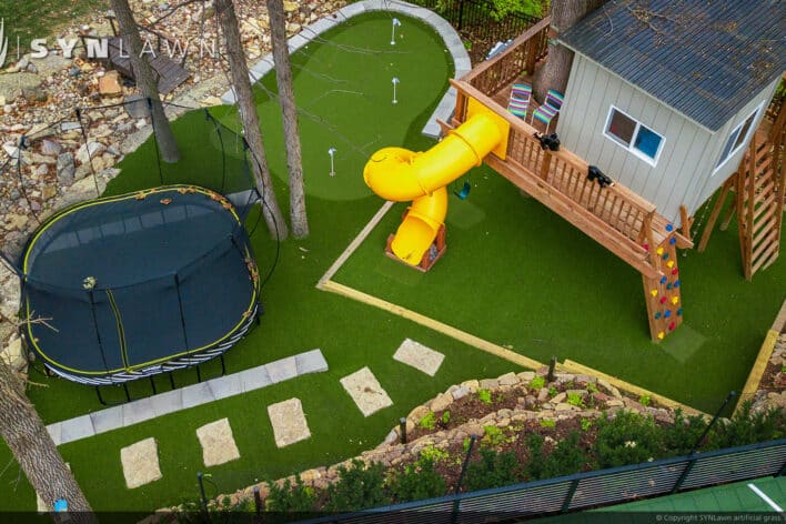 SYNLawn Utah residential backyard treehouse trampoline